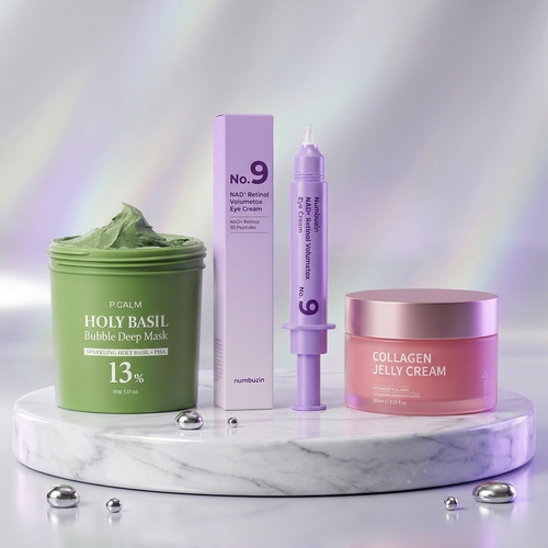 The Evening Ritual Trio — Holy Basil Bubble Mask, Numbuzin No.9 Eye Cream and Collagen Jelly Cream together on a marble podium